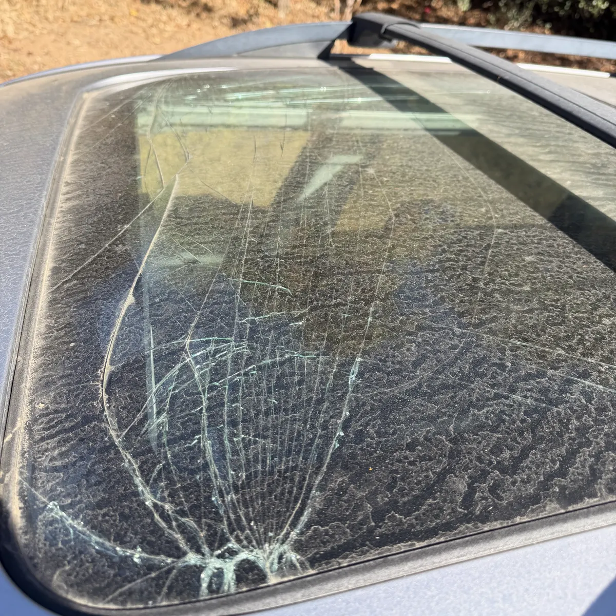 Cracked sunroof glass on a 2015 Subaru Forester in Loomis, CA before replacement